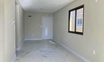 Imagem 7: Imóvel novo de 3 dormitórios sendo 1 suíte, sacada com churrasqueira, na praia de Palmas