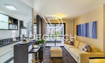 Imagem 3: Apartamento pra lá de aconchegante, com aquela sacada e churrasqueira à carvão, que faz a