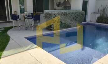 Imagem 2: Casa de condomínio para venda possui 470 metros quadrados com 5 quartos