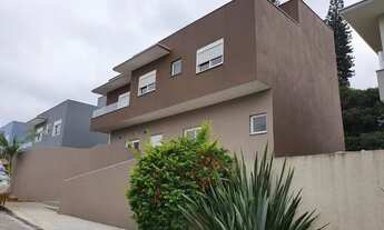 Imagem 2: Casa de condomínio para venda tem 238 metros quadrados com 4 quartos