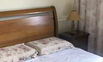 Imagem 3: Casa contendo três dormitórios em gramado