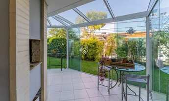 Imagem 5: Casa a venda em Santa Felicidade, com 03 quartos e vista para um lindo jardim