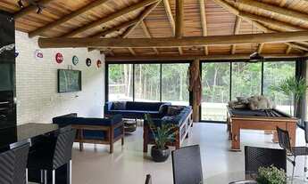 Imagem 5: Casa em condomínio térrea para venda tem 600 metros quadrados com 4 quartos