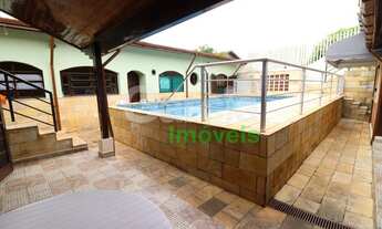 Imagem 1: Casa com 4 suítes e piscina em Peruíbe