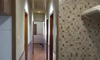 Imagem 6: Alugo casa de três quartos , sendo térrea . Santíssimo