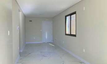 Imagem 6: Imóvel novo de 3 dormitórios sendo 1 suíte, sacada com churrasqueira, na praia de Palmas