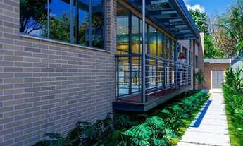 Imagem 4: Casa de condomínio para venda possui 409 metros quadrados com 4 quartos