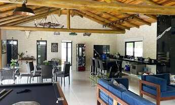 Imagem 2: Casa em condomínio térrea para venda tem 600 metros quadrados com 4 quartos