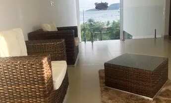 Imagem: Pé na areia. Luxuosa Casa de frente ao