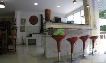 Imagem 7: Casa em condomínio com 5 dormitórios, 5 suites, piscina, 634 m², à venda por R$ 1.800.000