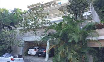 Imagem: Condomínio Grotão com quadra de tênis