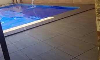 Imagem 5: Agio casa com piscina aquecida residencial Santa Fe pego camionete