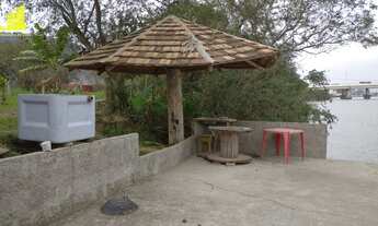 Imagem: Terreno na praia com acesso para o Rio Itajaí