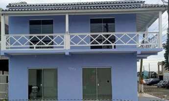 Imagem 2: Prédio com apartamento e sala comercial