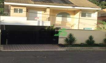 Imagem 2: Casa em condomínio com 5 dormitórios, 5 suites, piscina, 634 m², à venda por R$ 1.800.000