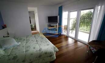 Imagem 7: LInda residência 5 suítes e piscina na beira da lagoa