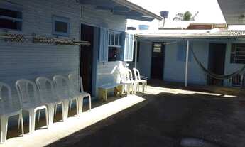 Imagem 5: Pousada com quatro kitnet, casa com três quartos no Balneário São Pedro