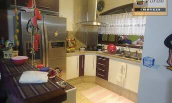 Imagem 4: Casa com 3 dormitórios (1 suíte), área para festas com churrasqueira e piscina no bairro J