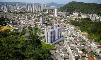 Imagem 3: Apartamento com 02 dormitórios sendo 01 suíte, banheiro social, living, sacada e 01 vaga d