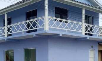 Imagem: Prédio com apartamento e sala comercial