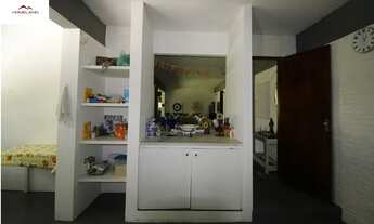 Imagem 7: Imóvel à Venda com Quatro Suítes e Vista Privilegiada para o Lago