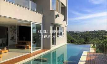 Imagem 2: Casa de condomínio para venda possui 512 metros quadrados com 5 quartos