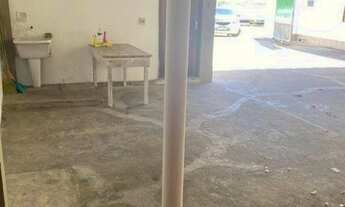 Imagem 5: Casa com 2 quartos, sala, 2 banheiros, cozinha, área de serviço, área externa com garagem