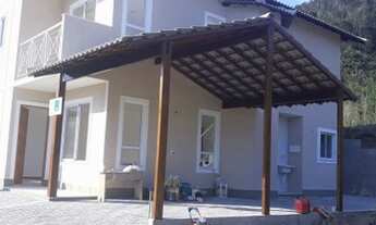 Imagem 3: Casa de condomínio para venda possui 150 metros quadrados com 4 quartos