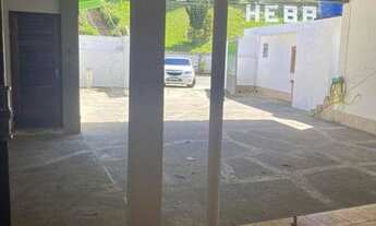 Imagem 3: Casa com 2 quartos, sala, 2 banheiros, cozinha, área de serviço, área externa com garagem