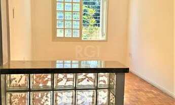 Imagem 5: Apartamento 2 dormitórios térreo com pátio, living 2 ambientes, churrasqueira, banheiro, c