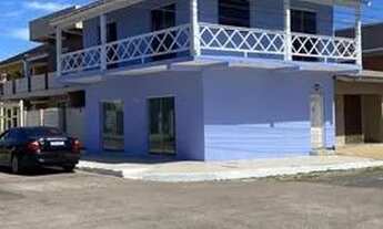 Imagem 6: Prédio com apartamento e sala comercial