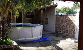 Imagem 7: Casa com 2 quartos sendo 1 suíte, com uma edícula com quarto e cozinha