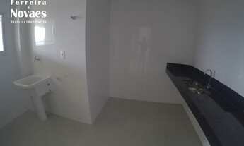 Imagem 3: Em localização privilegiada da Praia do Morro 2 quartos sendo uma suíte prédio com área de