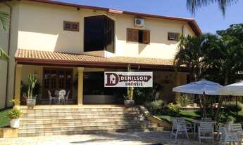 Imagem: Casa com 4 suítes à venda, 585 m² por