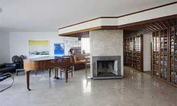 Imagem 3: Casa com muito verde e muitas flores no Jardim Guedala