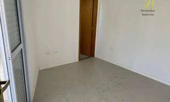 Imagem 2: Sobrado com 2 dormitórios à venda, 74 m² por R$ 265.000 - Caiçara - Praia Grande/SP