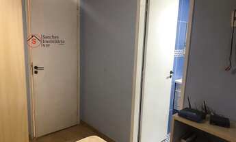 Imagem 4: Aconchegante apartamento à venda com 2 quartos, sendo 1 suíte, e 2 banheiros no total. O c