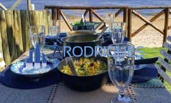 Imagem 6: Casa à beira mar, na praia de Itacimirim