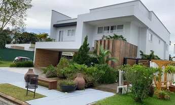 Imagem 2: Casa de condomínio para venda, 407m², dispondo de 4 suítes e 10 vagas, em Parque Verde - B