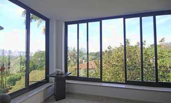 Imagem 4: Casa com muito verde e muitas flores no Jardim Guedala