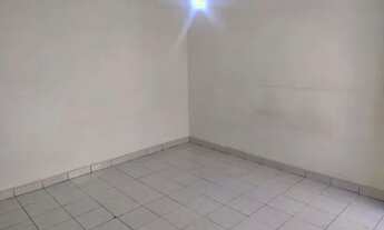 Imagem: Quarto com pia, tanque e banheiro