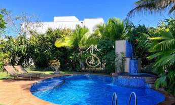 Imagem 6: Condomínio Jardim Acapulco Guarujá. Casa com construção sólida, muita madeira, espaços a