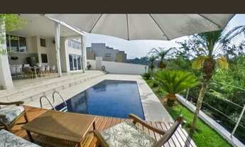 Imagem 6: Casa de condomínio para aluguel e venda tem 400 metros quadrados com 5 quartos