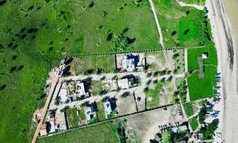 Imagem: Lotes em condomínio beira mar na praia