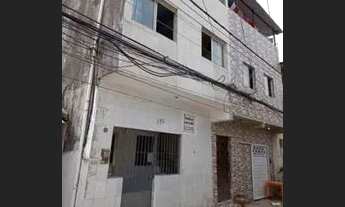 Imagem: 1 casa com 3 anda sendo 2 casa e uma cobertura