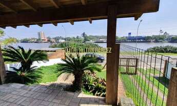 Imagem 3: Linda casa com 4 suítes e piscina na beira rio em Torres