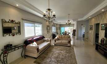 Imagem 2: Casa de condomínio para venda possui 300 metros quadrados com 4 quartos