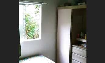 Imagem 3: Vendo três casas no centro da posse