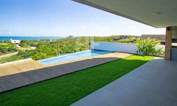 Imagem 2: Casa Alto Padrão com vista permanente para o mar, piscina e área gourmet