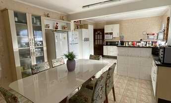 Imagem 5: Sobrado para venda possui 582 metros quadrados com 5 quartos em Mogi Moderno - Mogi das Cr